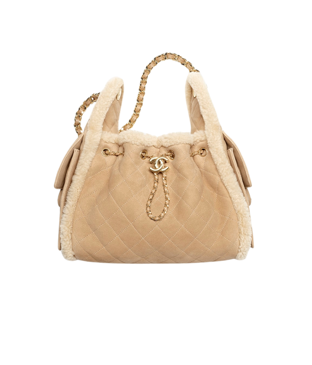 Chanel 25 Small Bag

Gamuza con borrego