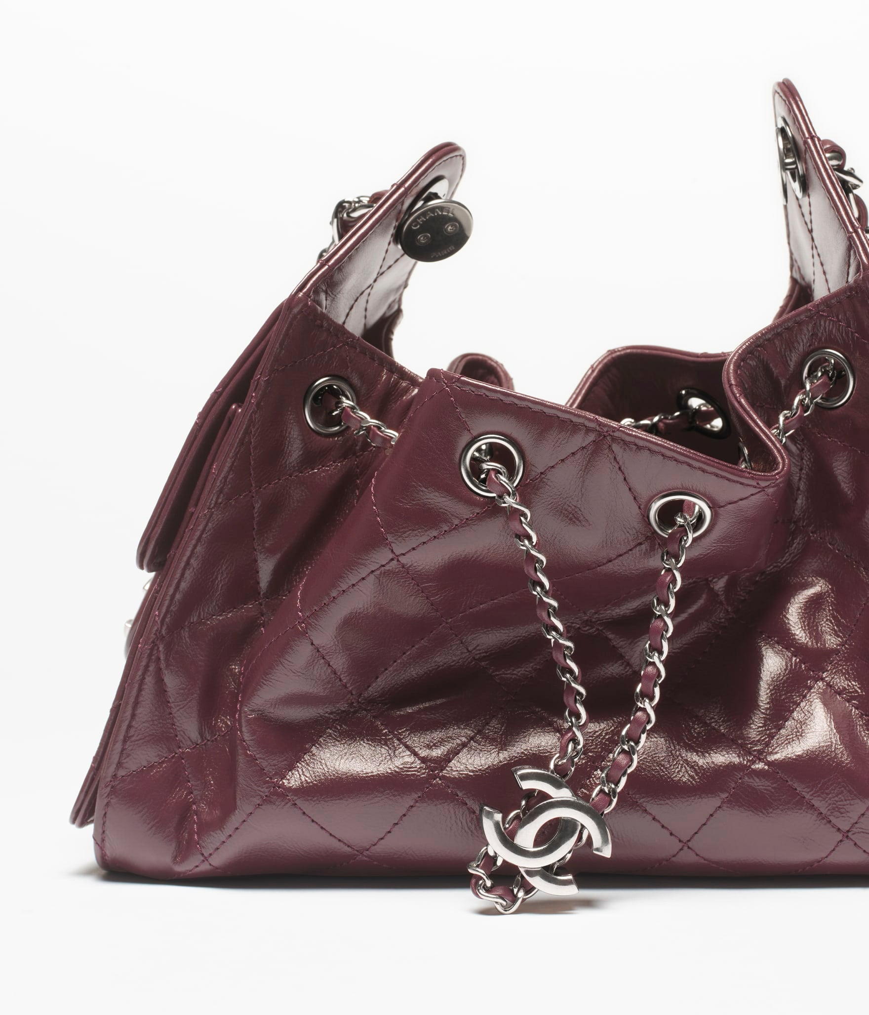 Chanel 25 Mini Bag

Charol acolchado