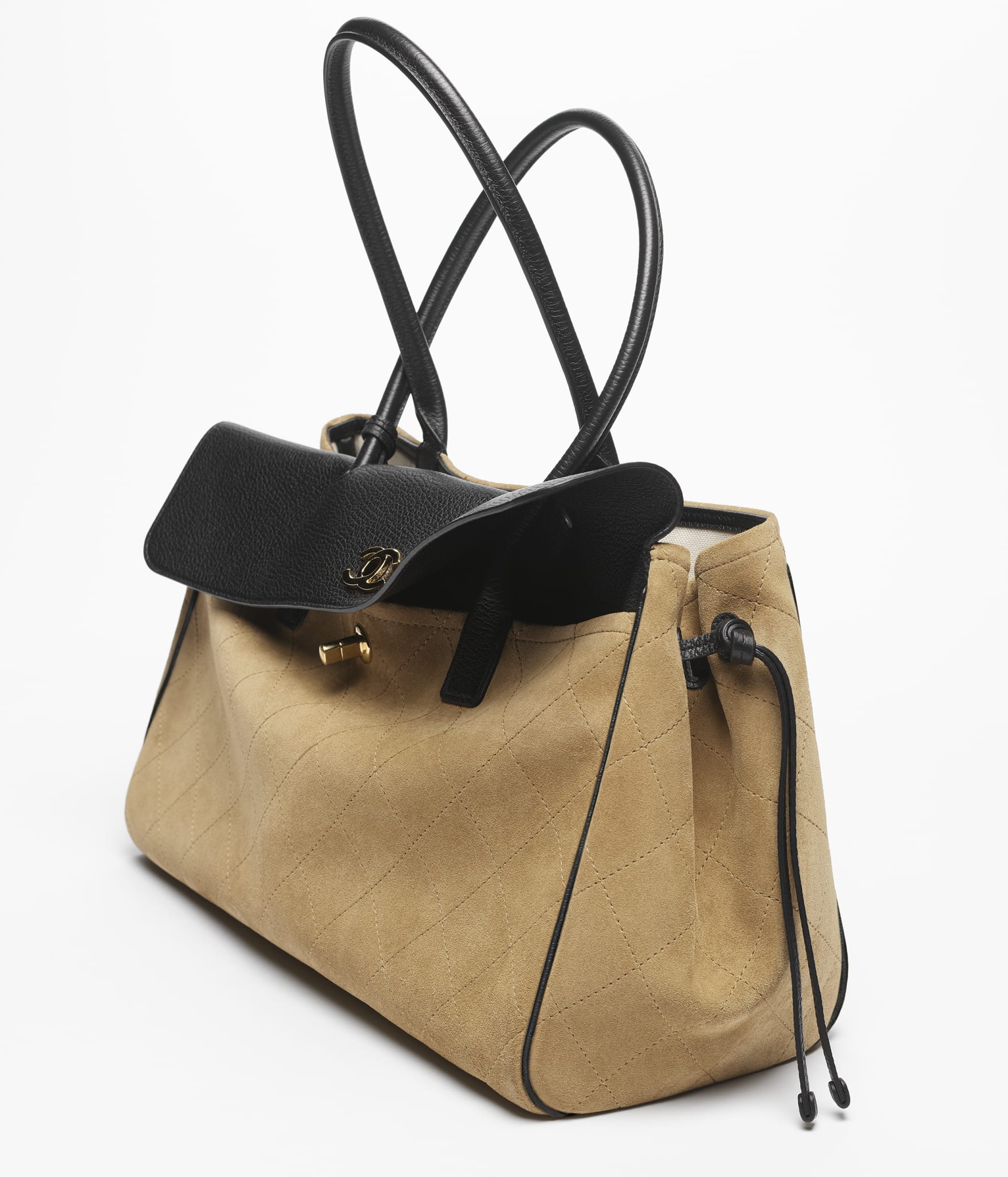 Chanel Shopping Bag

Gamuza y cuero granulado