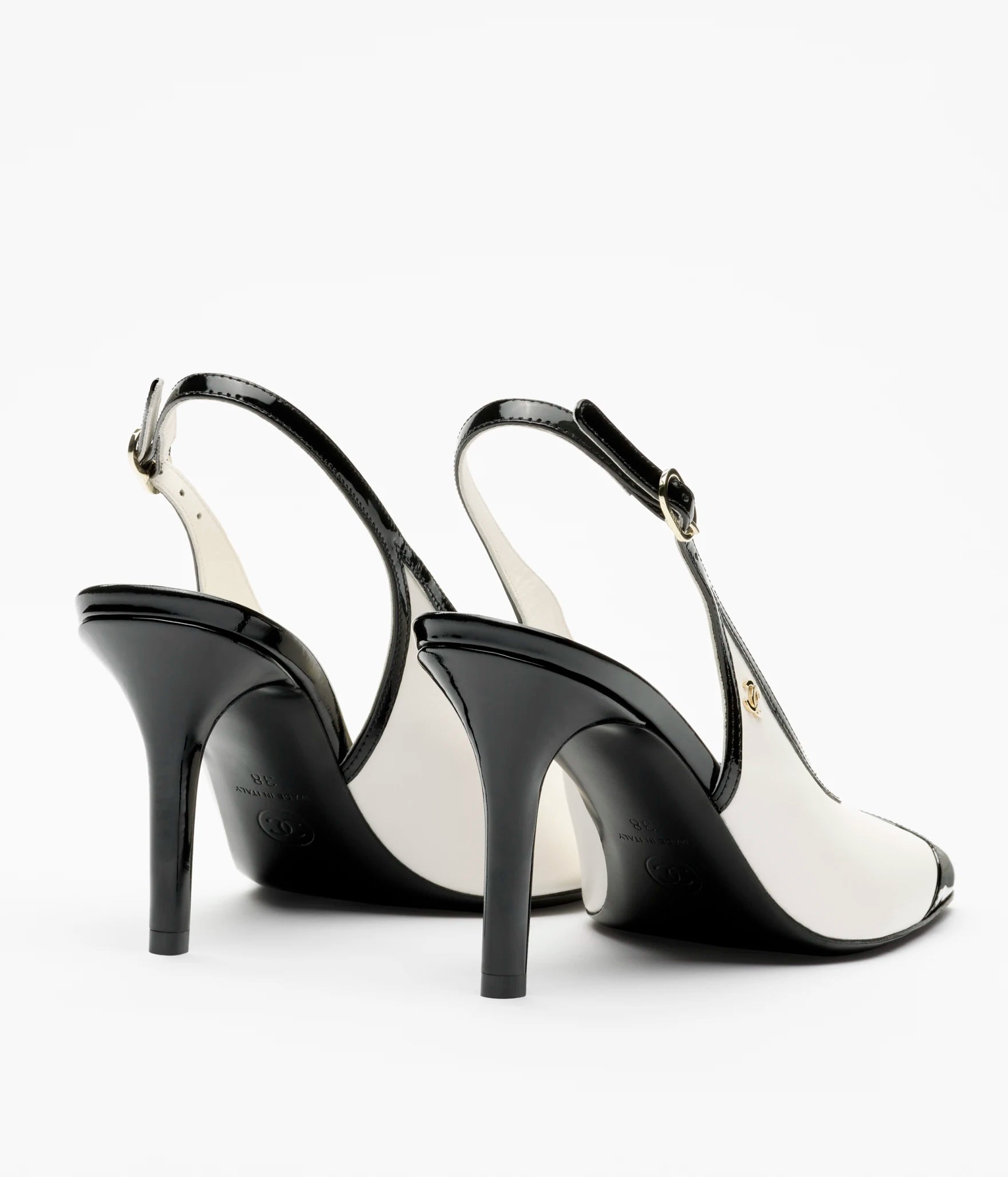 CHANEL Slingback Pumps

Color: White/Black
