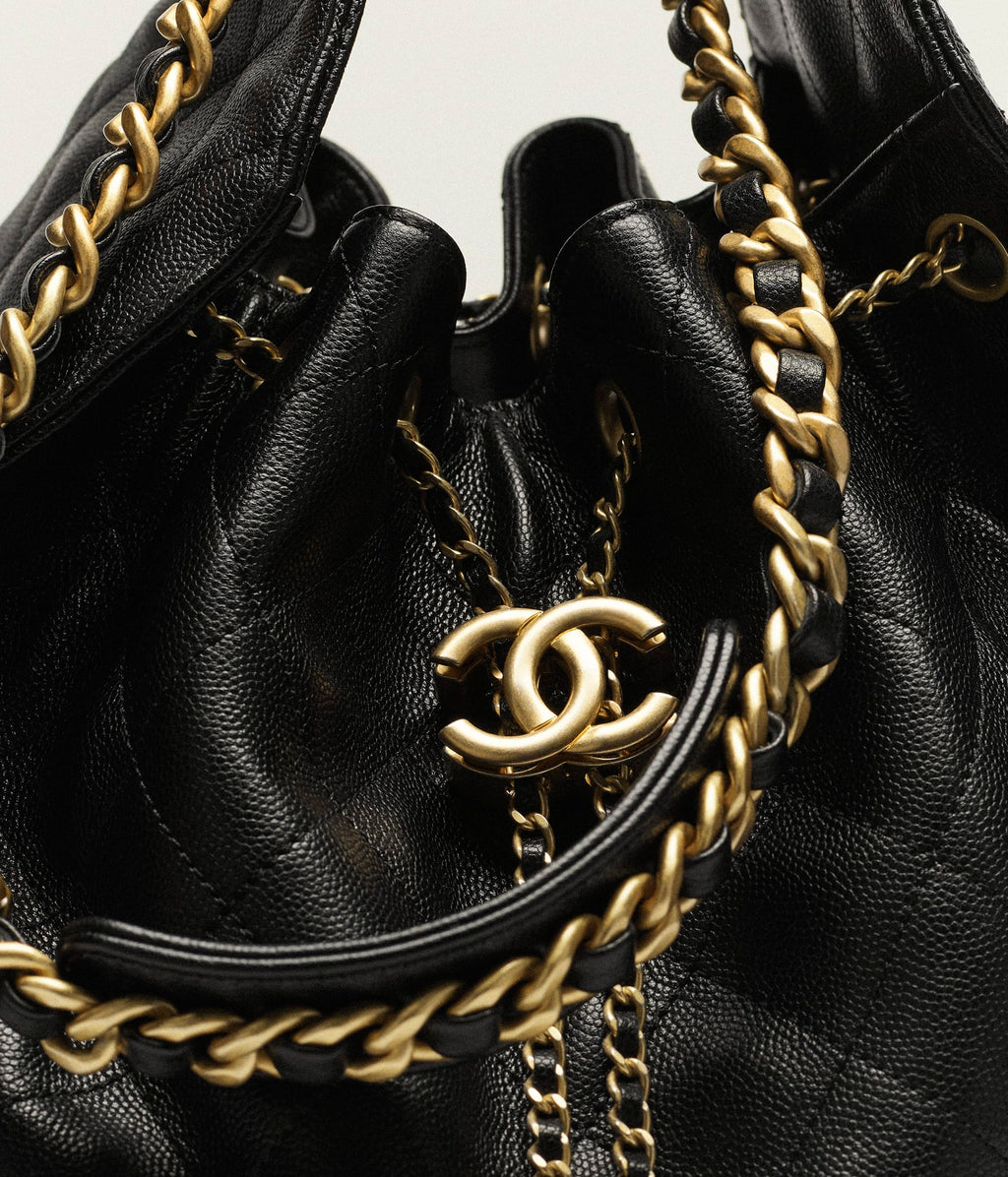 Chanel 25 Medium Bag

Cuero caviar acolchado