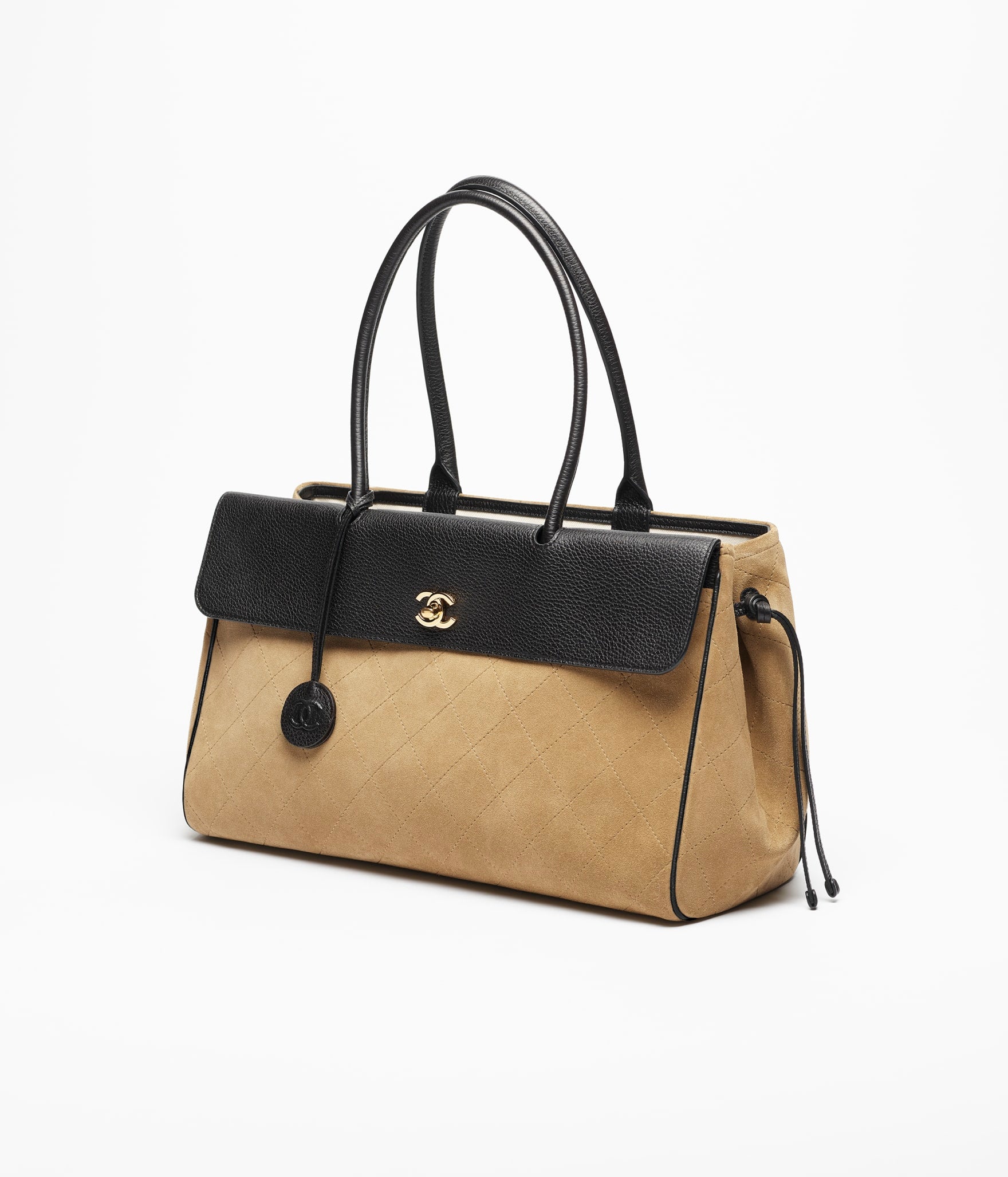 Chanel Shopping Bag

Gamuza y cuero granulado