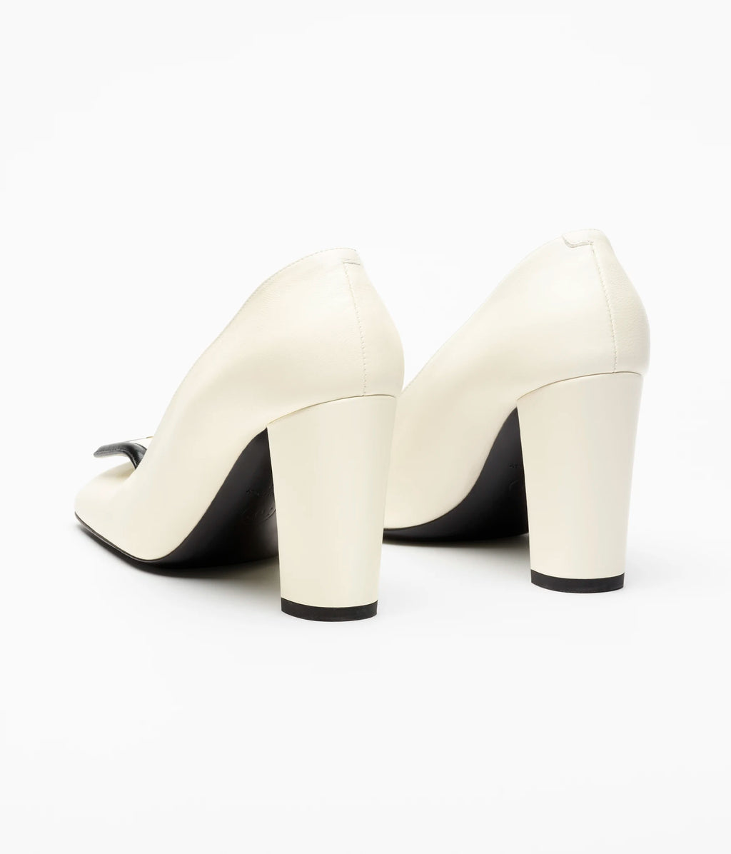 CHANEL Buckle Pumps

Color: White/Black