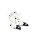 CHANEL Two-Tone Mary Jane Pumps

Color: Blanco/Negro