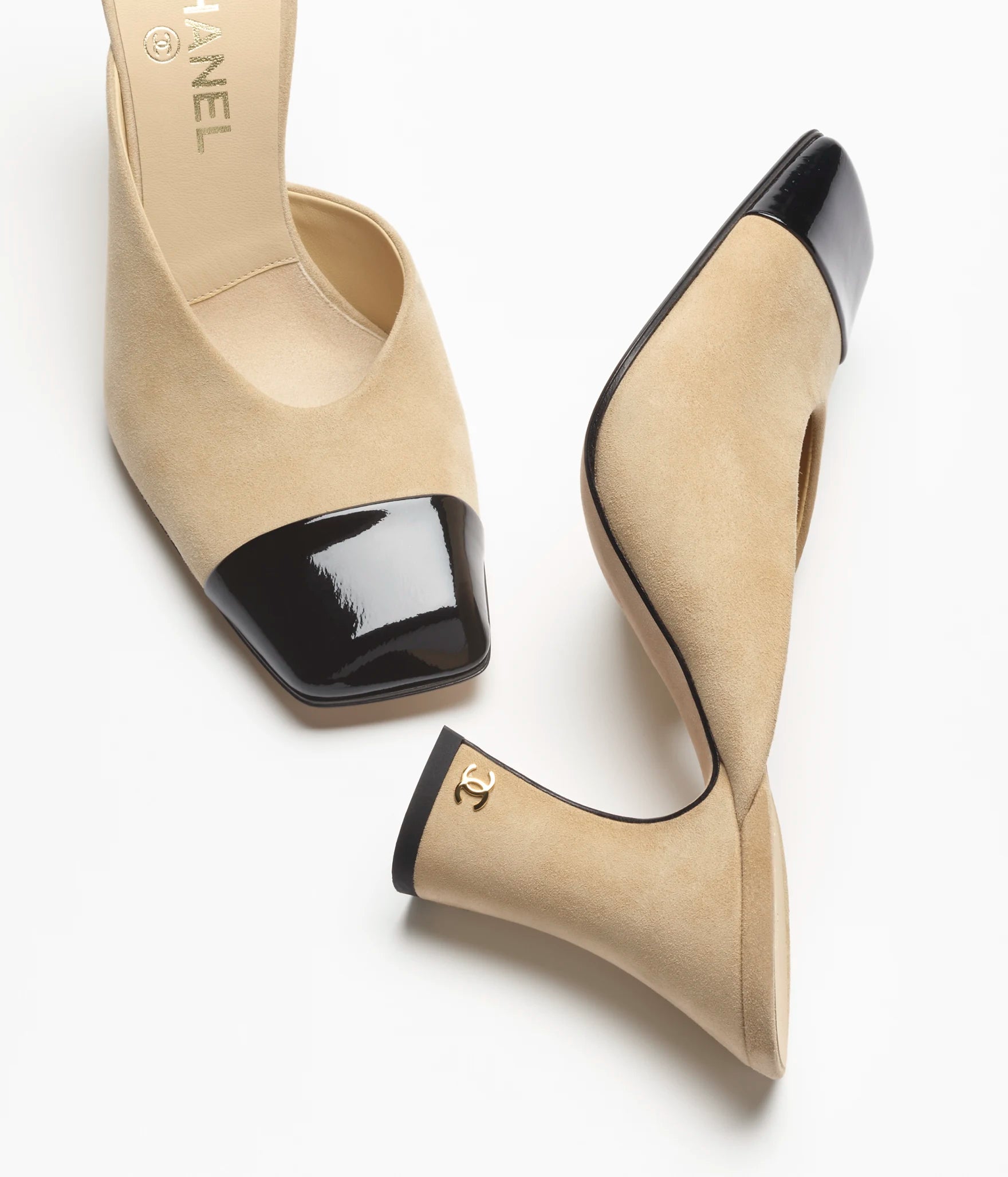 CHANEL Cap-Toe Mules

Color: Beige/Black