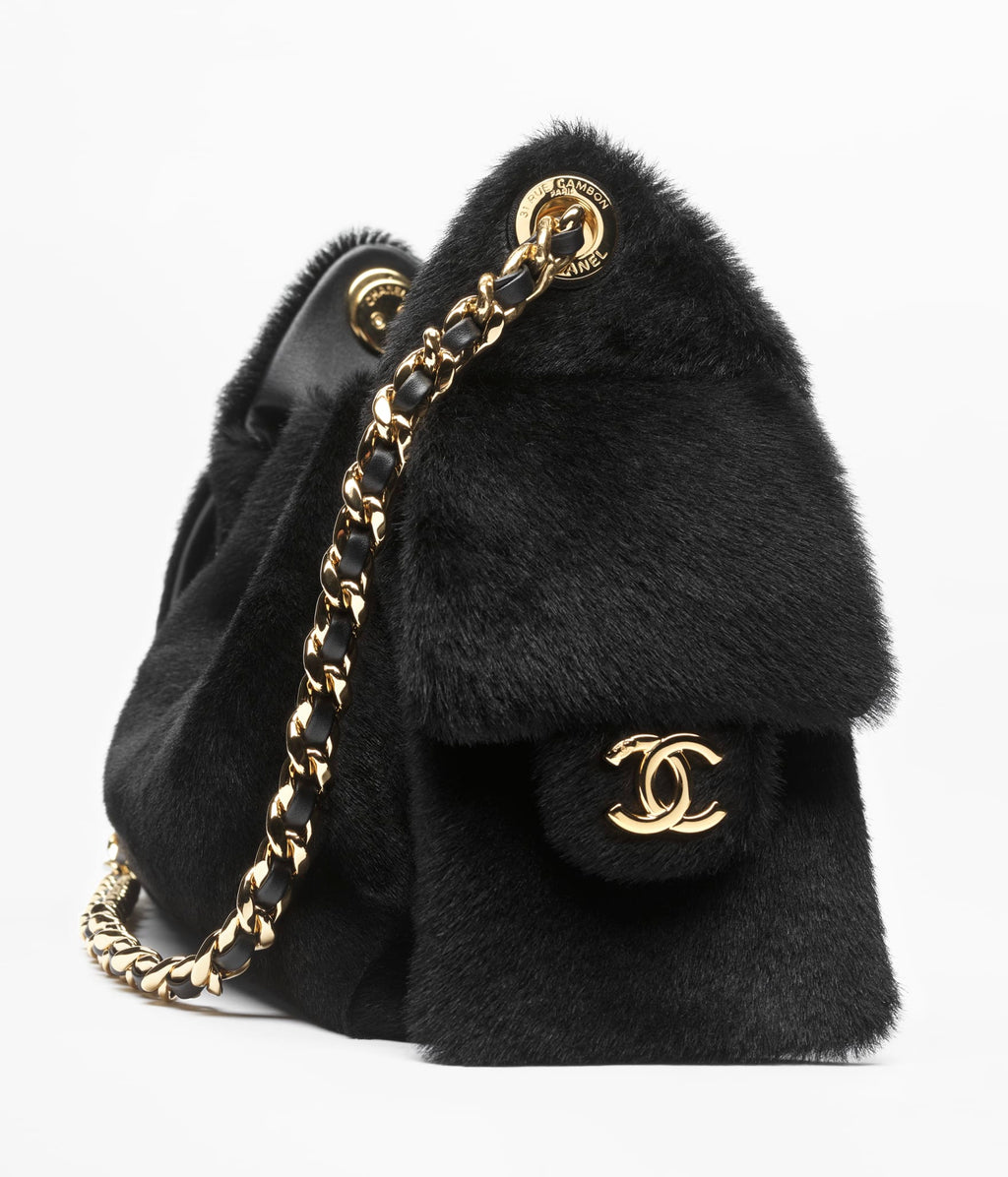 Chanel 25 Mini Bag

Piel de becerro