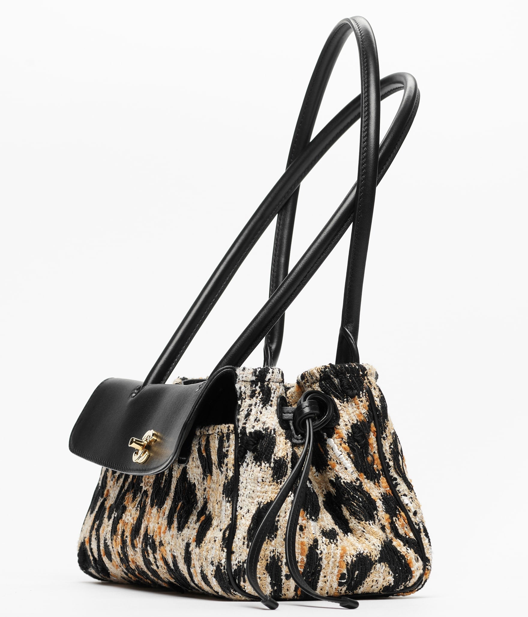 Chanel 25 Bowling Bag

Tweed con estampado animal