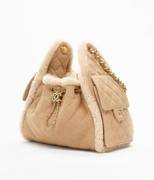 Chanel 25 Small Bag

Gamuza con borrego