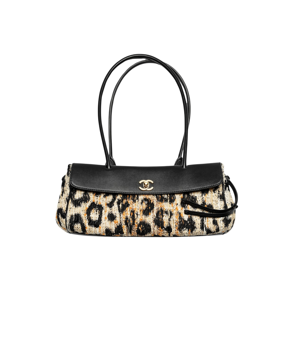 Chanel 25 Bowling Bag

Tweed con estampado animal