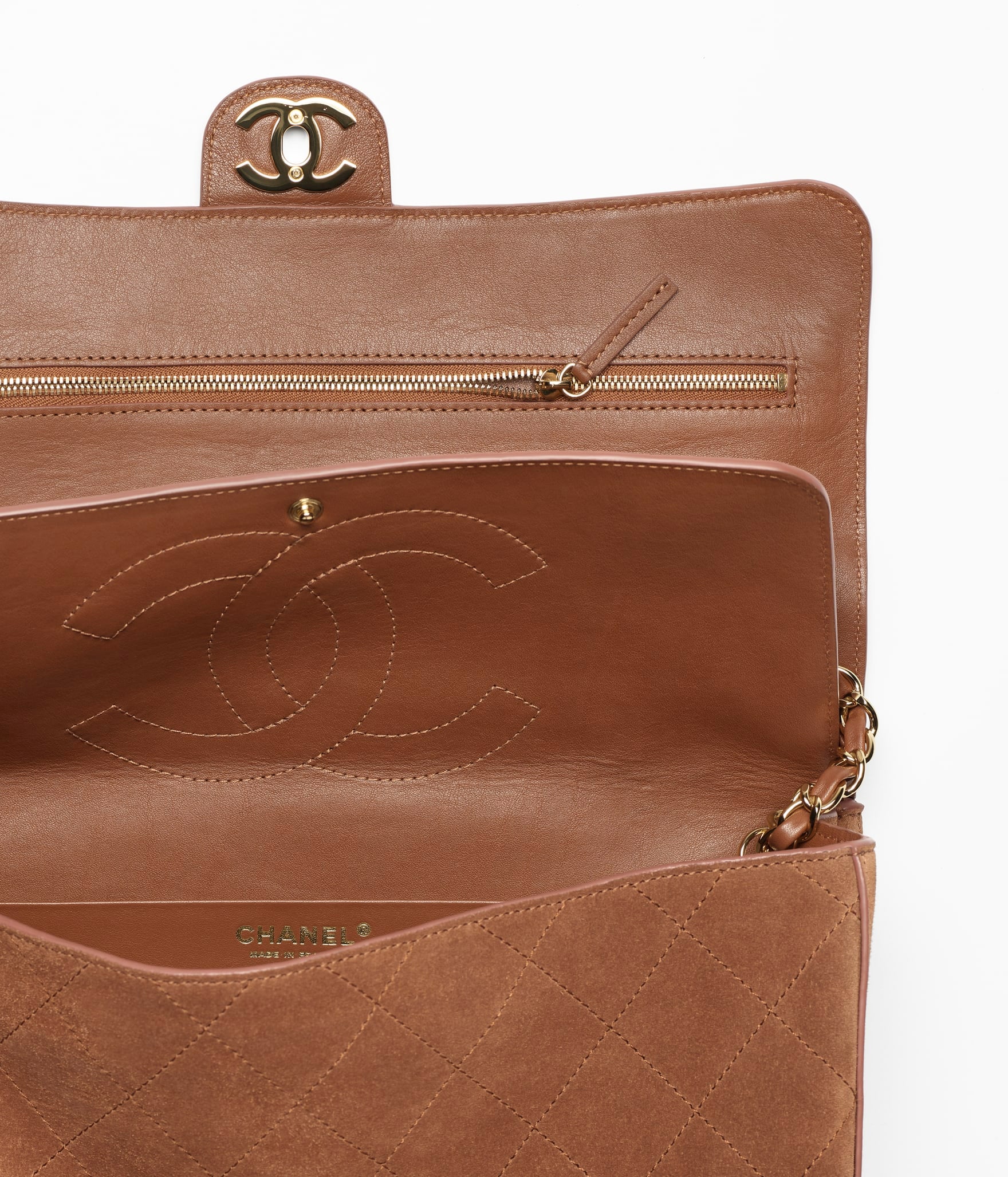 Chanel Classic Flap Maxi

Ante acolchado (Suede) – Camel