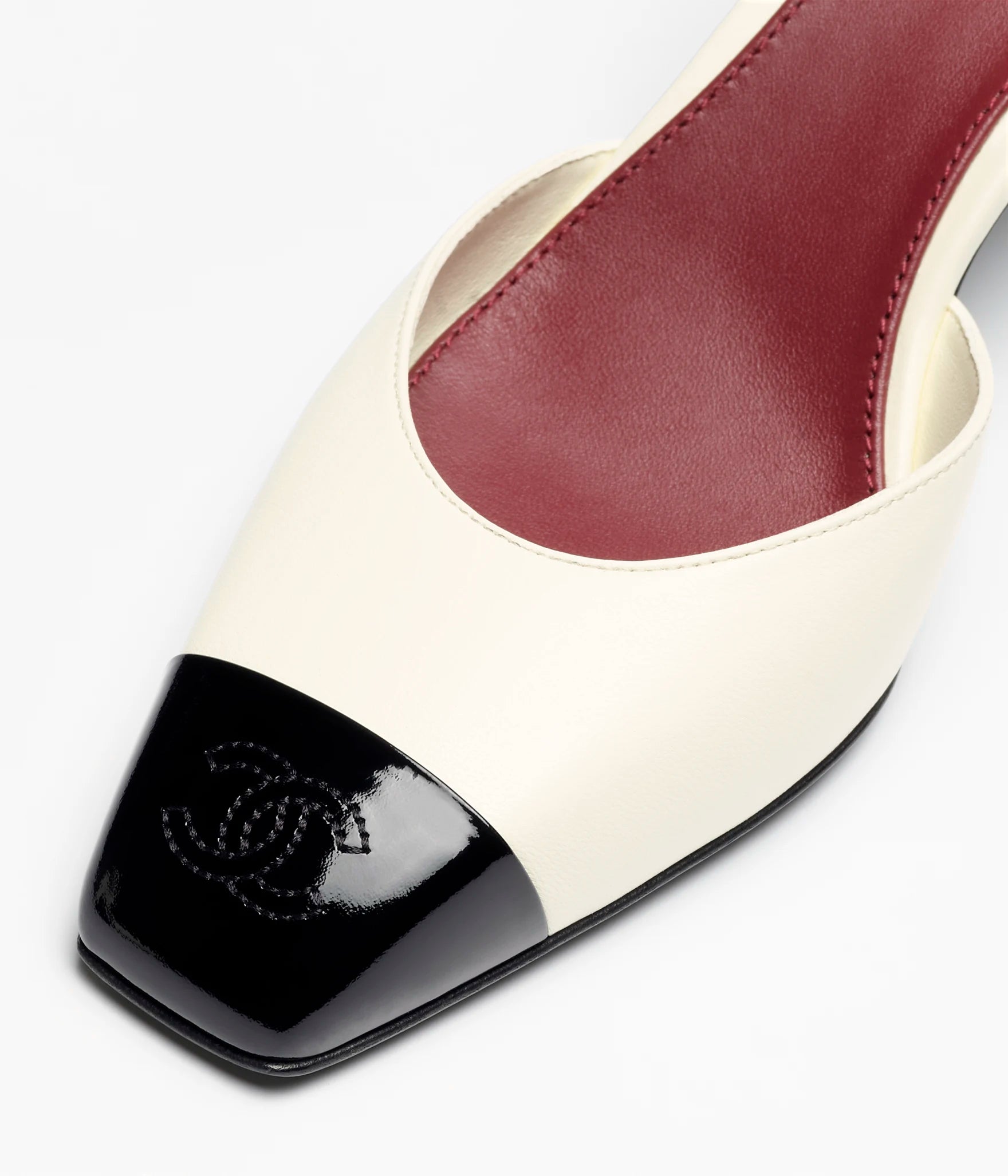 CHANEL CC Slingback Pumps

Color: White/Black