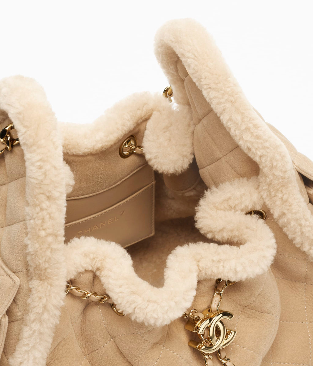 Chanel 25 Small Bag

Gamuza con borrego