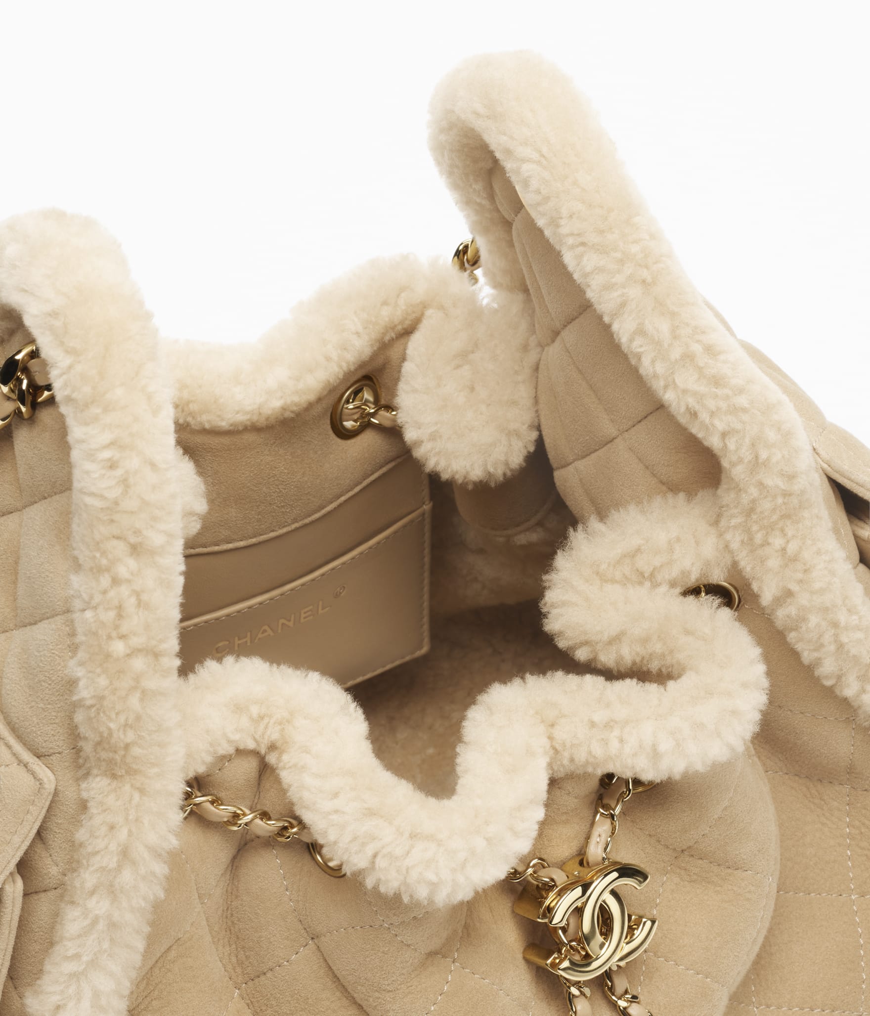 Chanel 25 Small Bag

Gamuza con borrego