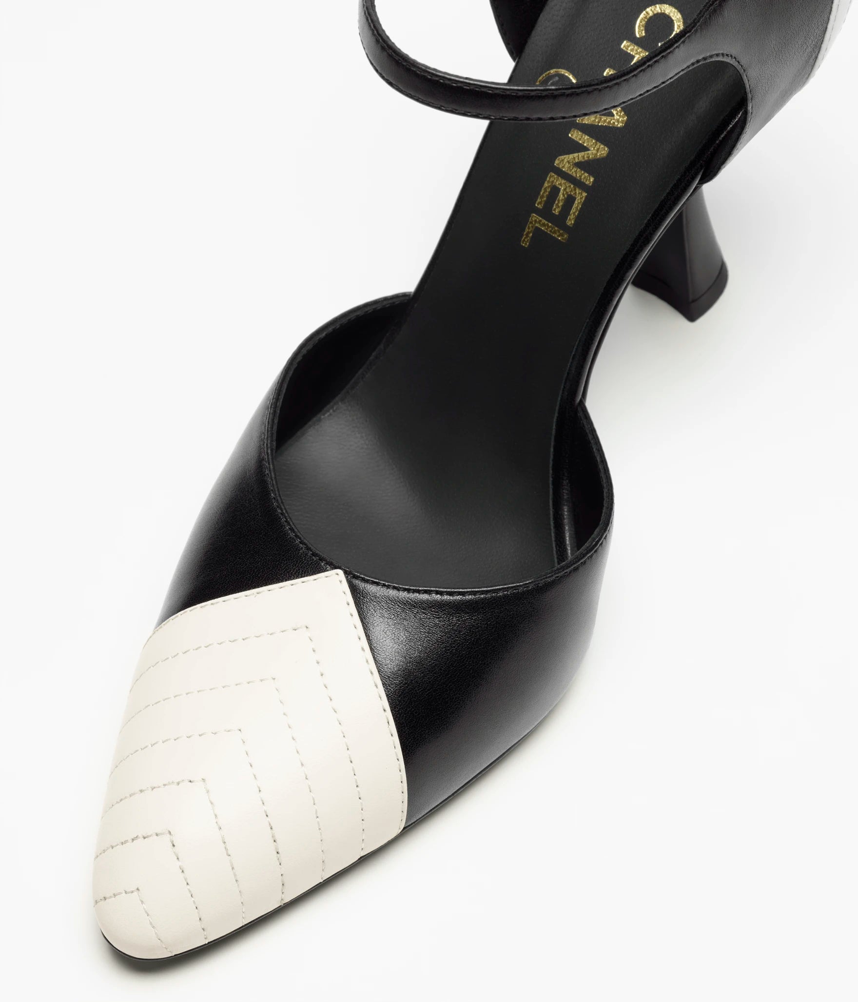 CHANEL Two-Tone Mary Jane Pumps

Black/White