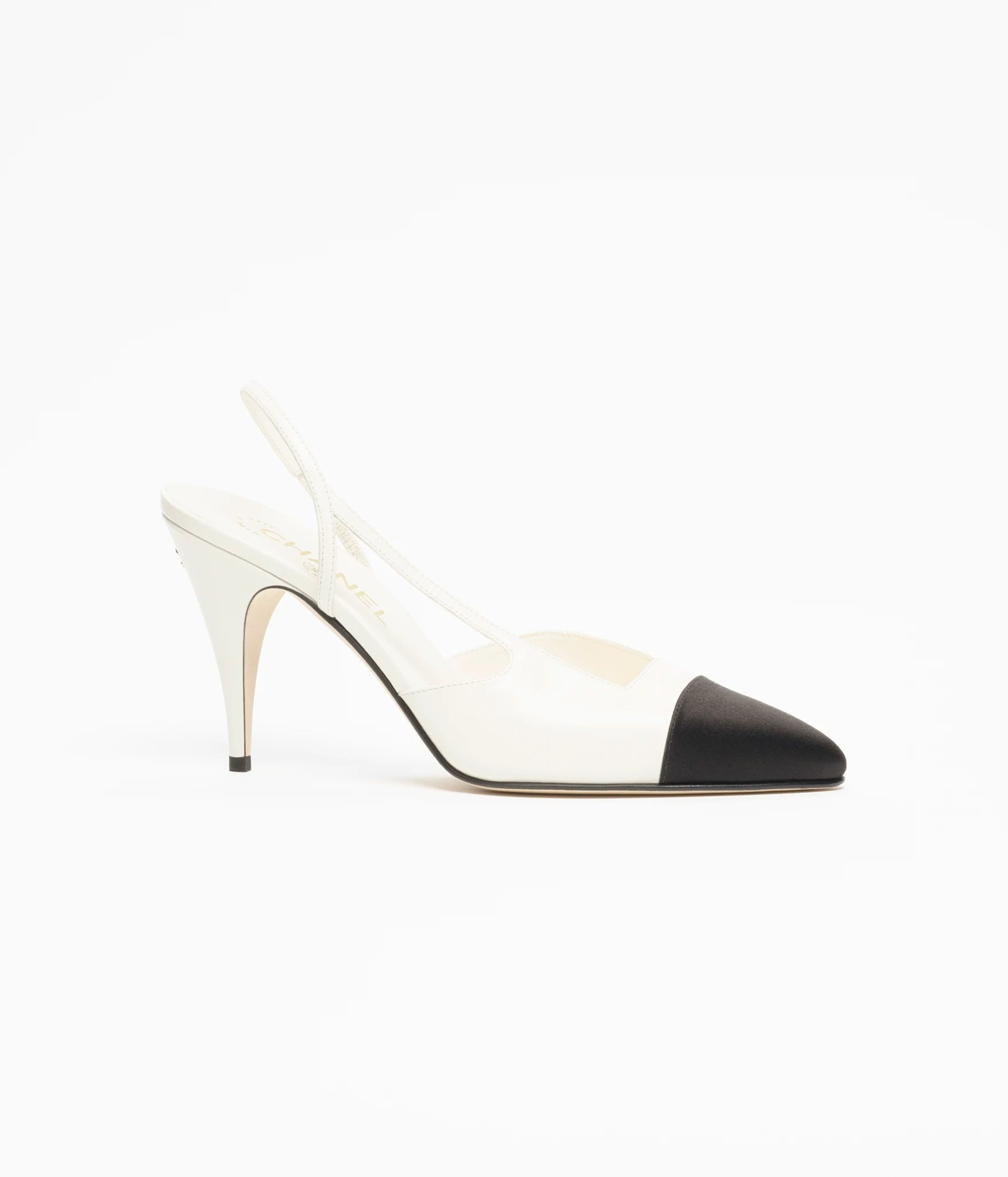 Chanel Cap-Toe Slingbacks

Color: White/Black