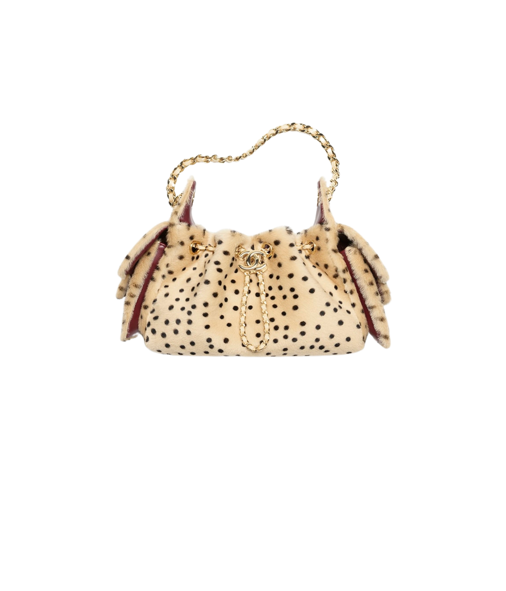 Chanel 25 Mini Bag

Piel de becerro estampado