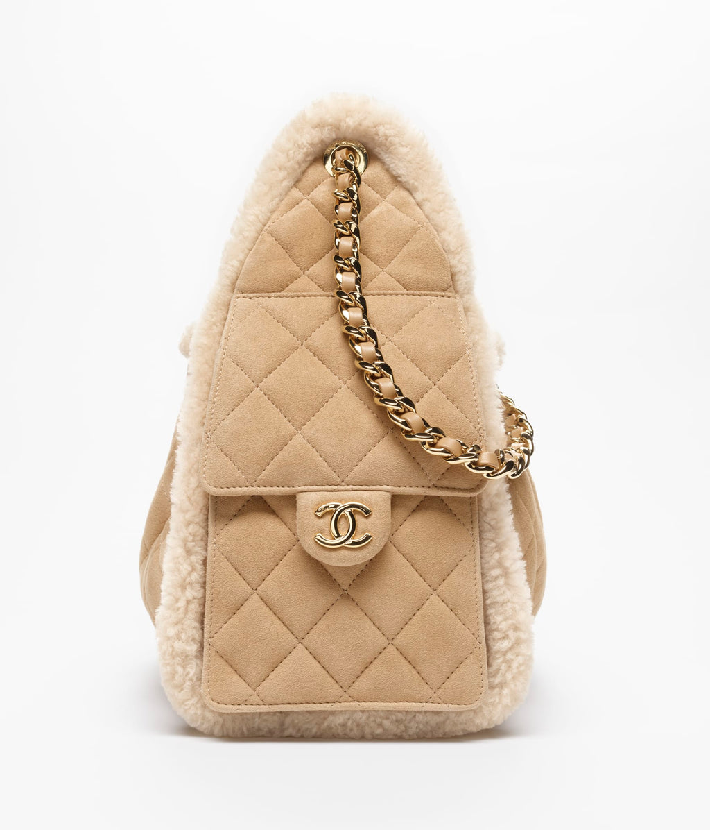 Chanel 25 Small Bag

Gamuza con borrego