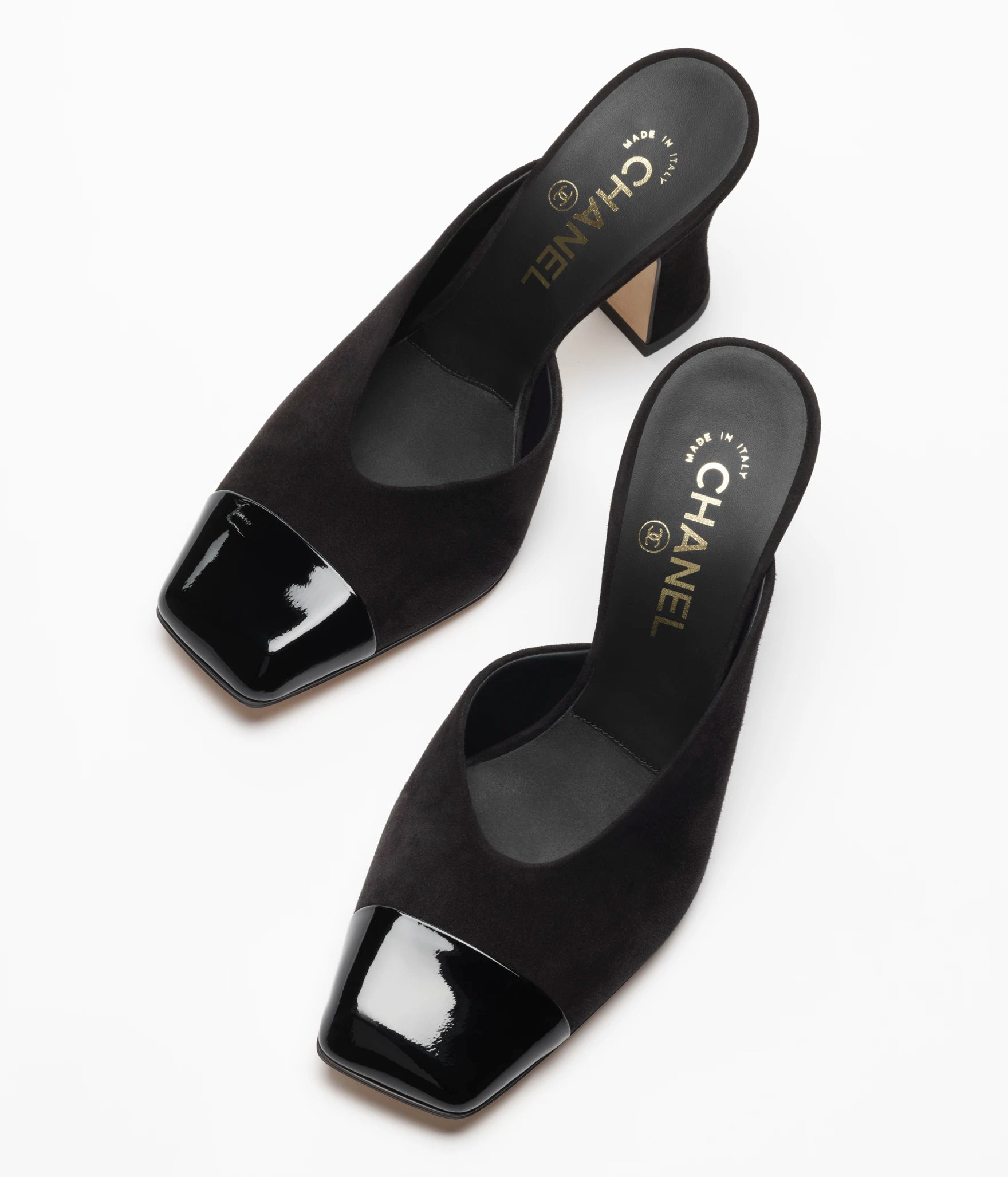 CHANEL Cap-Toe Mules

Color: Black