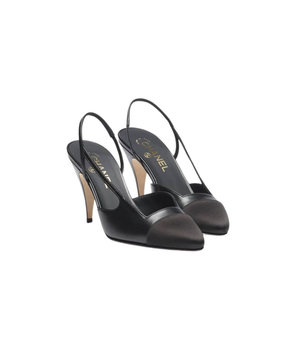 Chanel Cap-Toe Slingbacks

Color: Black