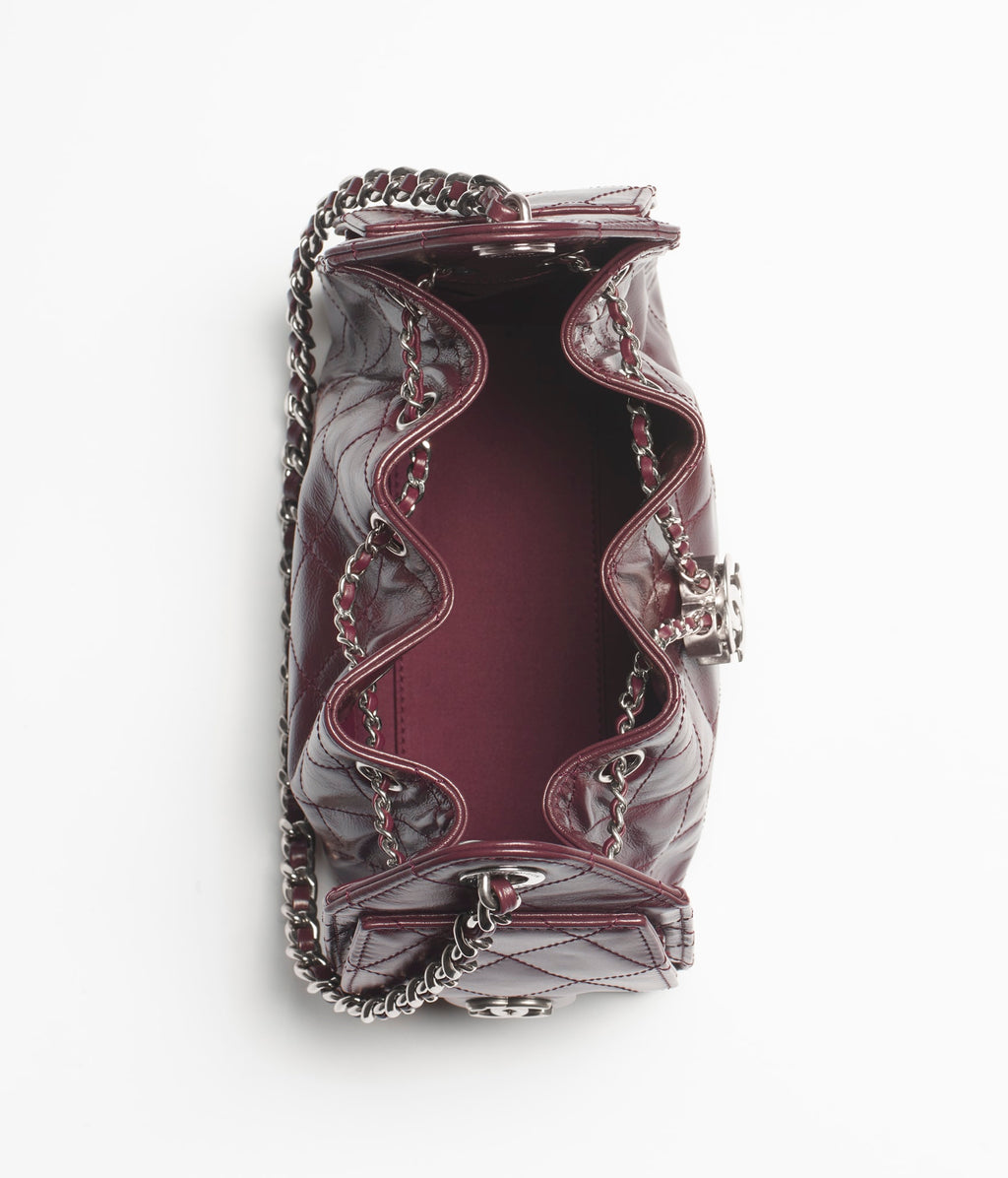 Chanel 25 Mini Bag

Charol acolchado