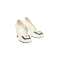 CHANEL Buckle Pumps

Color: White/Black